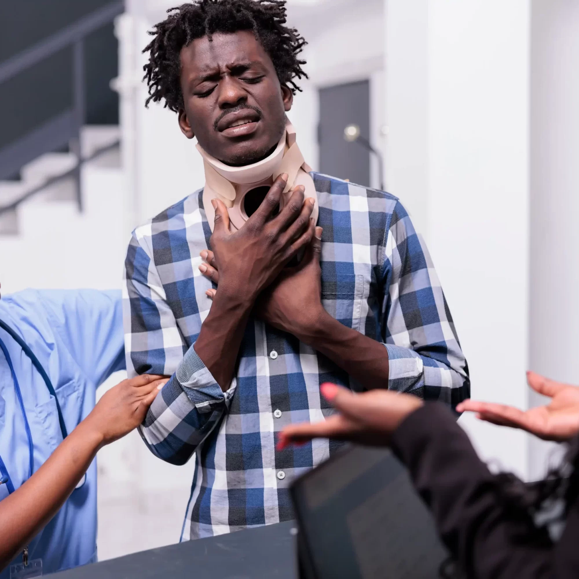 man-with-medical-neck-brace-receiving-support-2025-02-19-15-34-21-utc